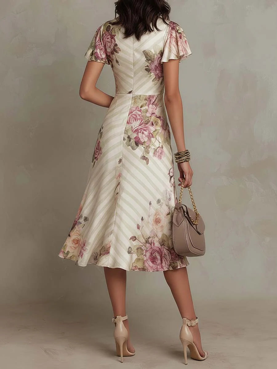 Luisa | Abito midi in raso con elegante motivo floreale rétro