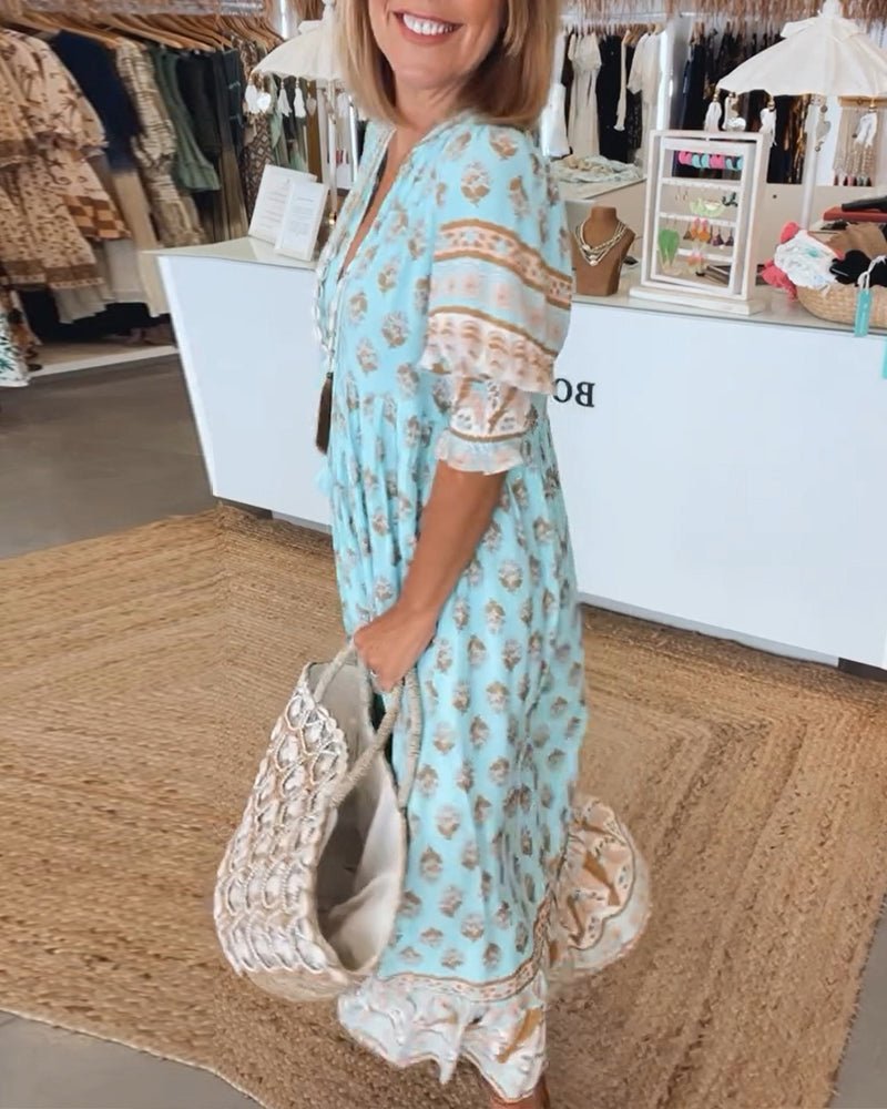 MANA | ABITO MIDI FLOREALE CHIC CON SCOLLO A V
