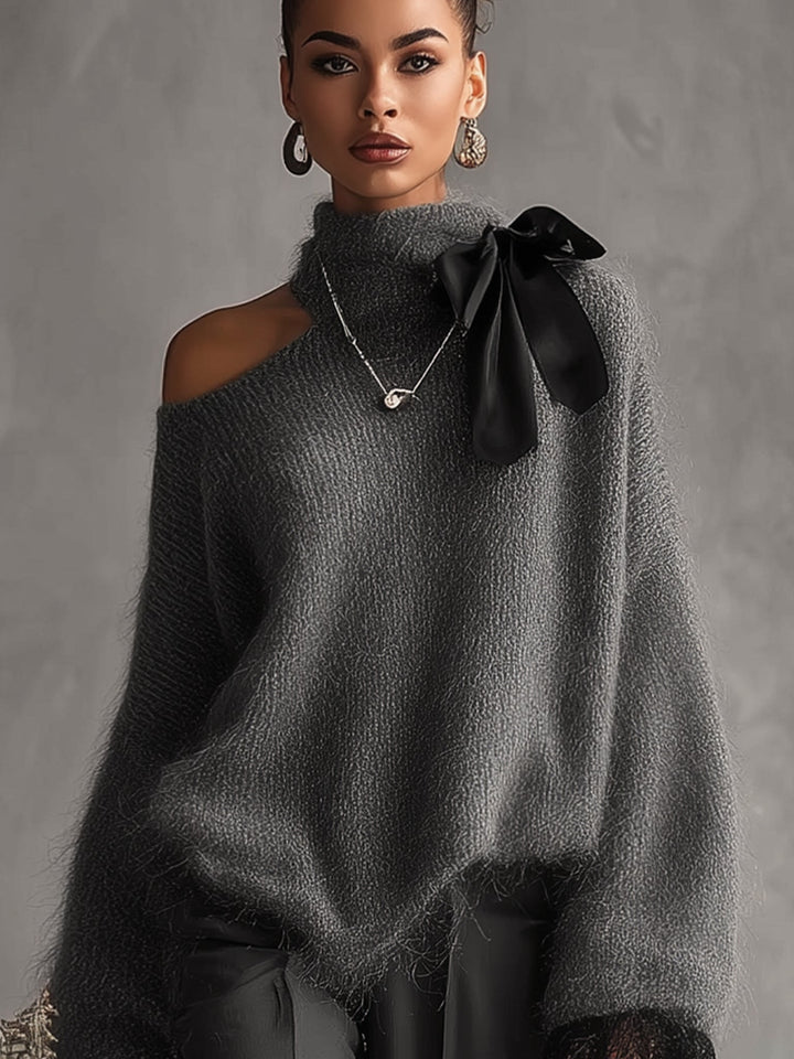 Maglione in maglia di mohair grigio con polsini in pizzo