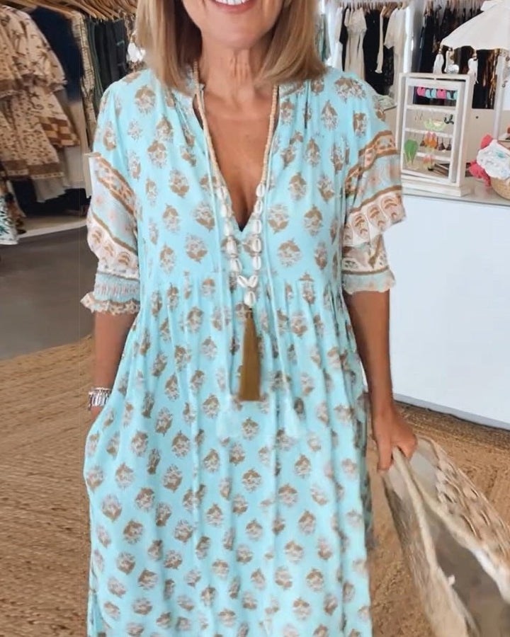 MANA | ABITO MIDI FLOREALE CHIC CON SCOLLO A V
