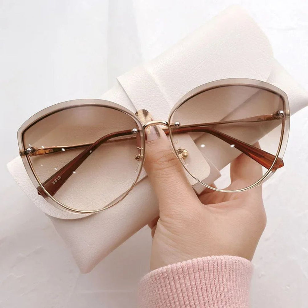 Occhiali da sole cat-eye senza montatura Celeste