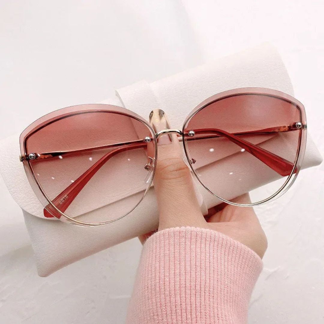 Occhiali da sole cat-eye senza montatura Celeste